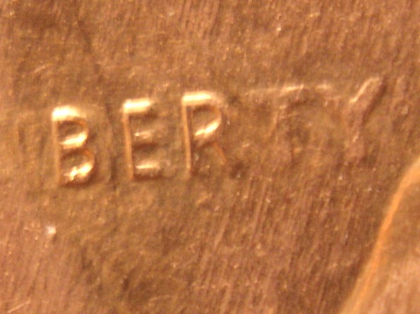 1990-P-Lincoln-Memorial-Cent-Struck-Through-Or-Post-Mint-Damage?